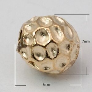 Metallihelmi ovaali 8x7 mm taottu pinta ruusukullan värinen, 10 kpl