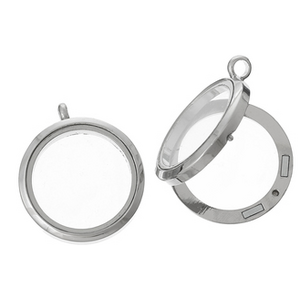 Medaljonkiriipus kirkas lasi hopeanvärisellä reunuksella n. 30 mm, 1 kpl